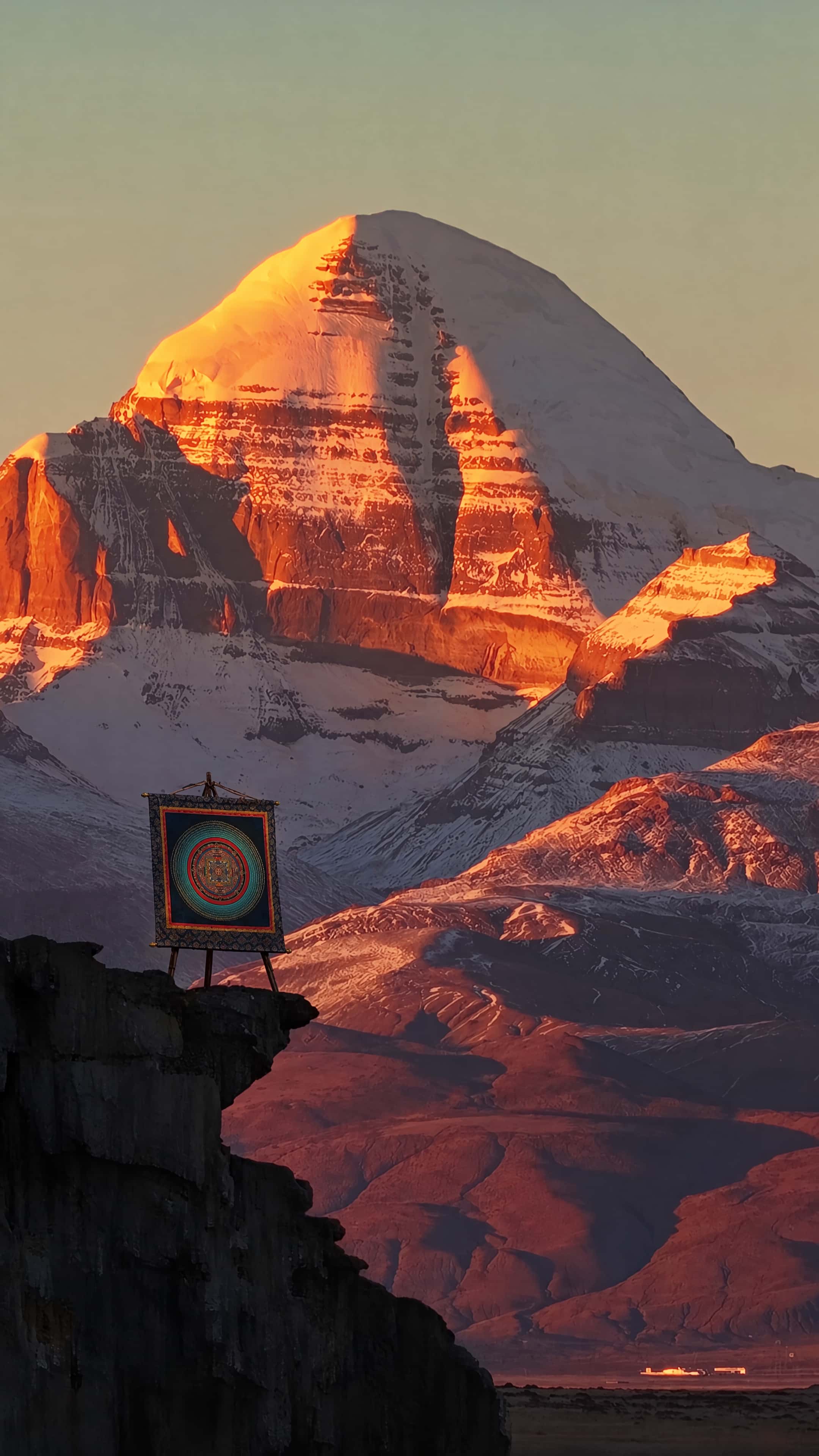 Handcrafted sacred mandala thangka on Mount Kailash peak during golden sunrise, healing wall art for anxiety, positive energy and meditation sanctuary
